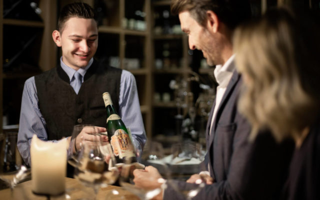 Sommelier advises hotel guests